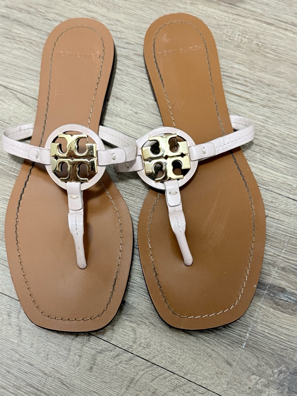 Tory Burch White Leather Logo Thong Sandals with Gold Medallion